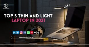 A lineup of sleek, thin, and lightweight laptops arranged on a modern desk.
